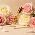 Love Potion Body Oil with roses in the background