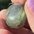 Video of Polished Oval Labradorite Pendant necklace with blue-green flash- stone of Intuition, aura protection, and transformation. 