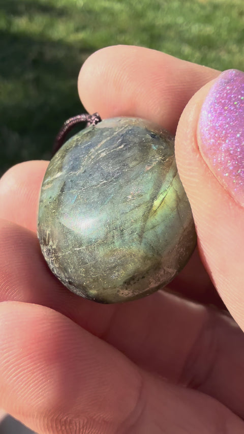 Video of Polished Oval Labradorite Pendant necklace with blue-green flash- stone of Intuition, aura protection, and transformation. 